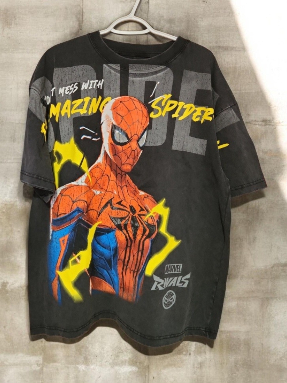 Marvel Mens Oversized Spider-Man Graphic Tee with Orange and Blue Print
